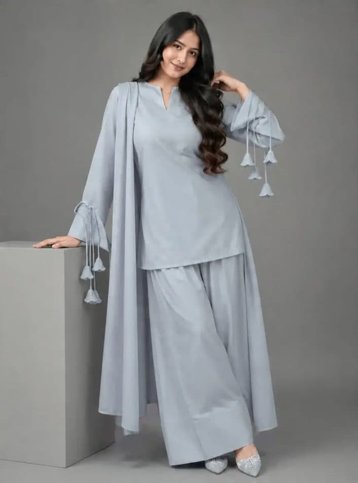 A plain phone photo of a grey kurta set, the kind you send in